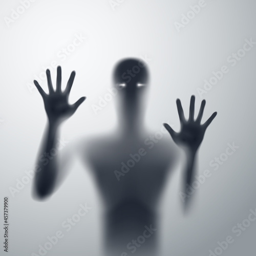 Horror Man Behind the Matte Glass in Black and White. Blurry hand and body figure abstraction. Halloween Background. Murder or Criminal Concept