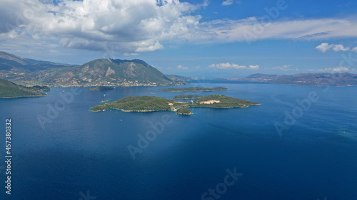 Aerial drone panoramic photo of iconic vegetated paradise island of Skorpios formerly owned by Aristotle Onassis, Lefkada island, Ionian, Greece photo