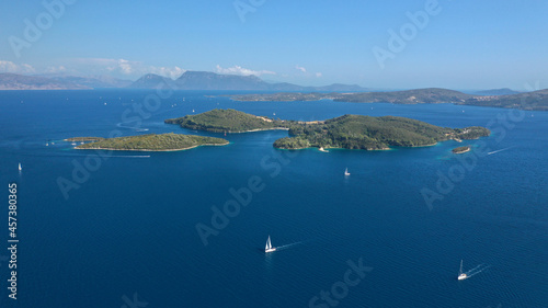 Aerial drone panoramic photo of iconic vegetated paradise island of Skorpios formerly owned by Aristotle Onassis, Lefkada island, Ionian, Greece