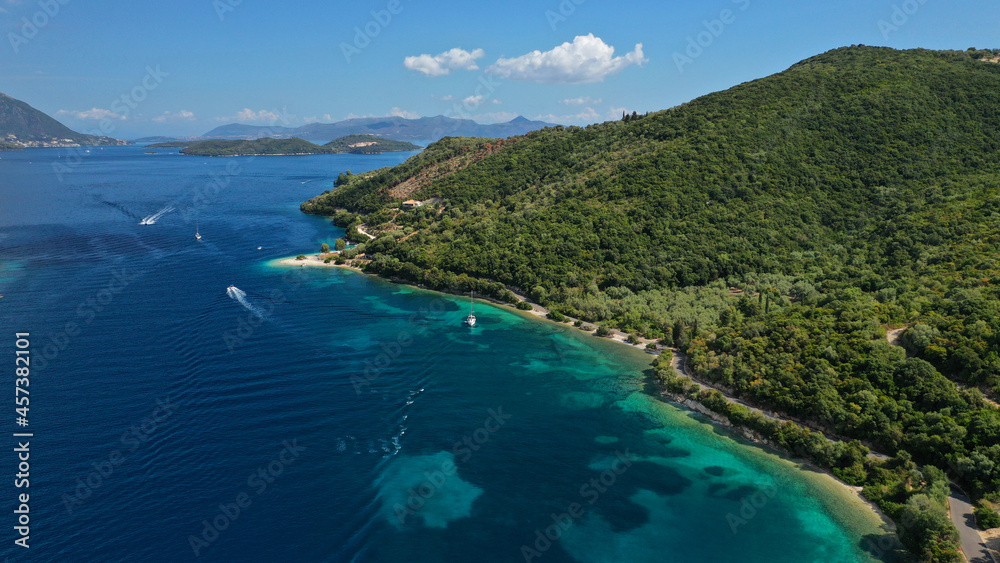 Aerial drone photo of paradise turquoise beach of Amoglossa meaning a sand tongue with crystal clear sea, Ionain, Greece