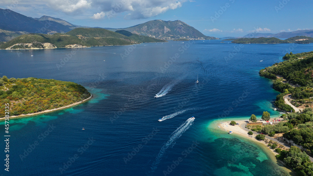 Fototapeta premium Aerial drone photo of paradise turquoise beach of Amoglossa meaning a sand tongue with crystal clear sea, Ionain, Greece