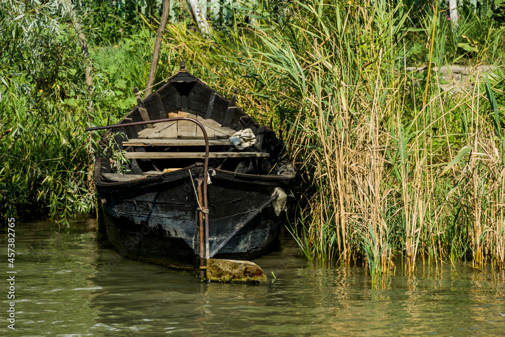 old wooden boat in the river