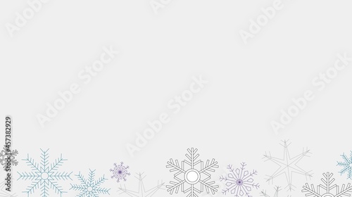 Grey, purple and blue snowflakes along bottom of illustration with copy space on grey background. Winter, seasonal, holidays.