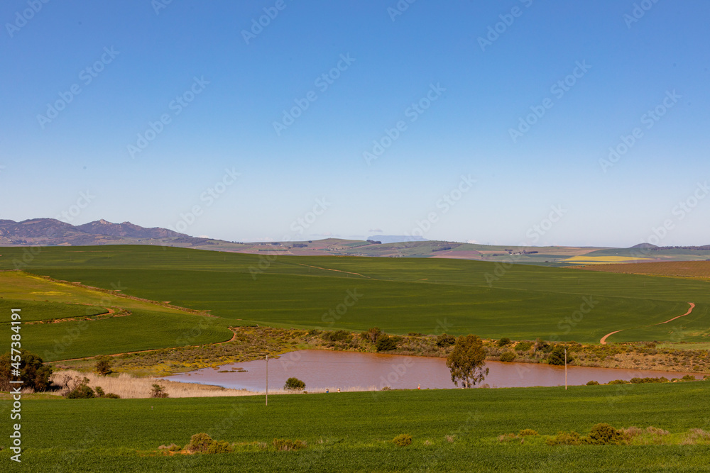 General view of countryside landscape with cloudy sky