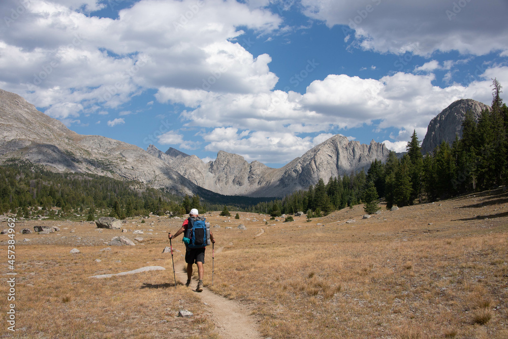 Trekking to the breathtaking Cirque of Towers, seen from Shadow Lake, Wind River Range, Wyoming, USA Trekking to the breathtaking Cirque of Towers, seen from Shadow Lake, Wind River Range, Wyoming, USA