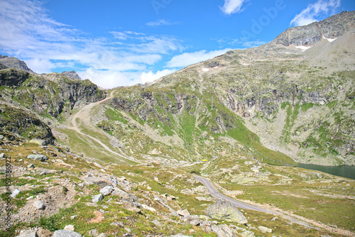 Hiking in Mölltaler Glacier area, high mountains, glacier, waterdams and cows on pastures  photo