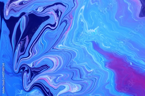 Abstract blue marble background. The lines and waves of acrylic paint create an interesting structure. Background for web design  fabric  design  laptop case.
