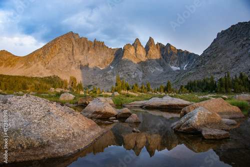 Evening light on the breathtaking Cirque of Towers, seen from Shadow Lake, Wind River Range, Wyoming, USA