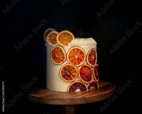 Blood Orange Carrot Cake on Wood Cake Stand
