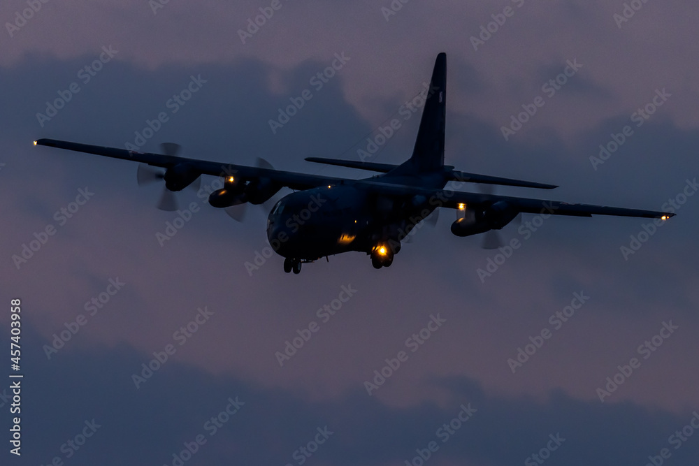 Military four-engine aircraft approaching airfield Military four-engine aircraft approaching airfield