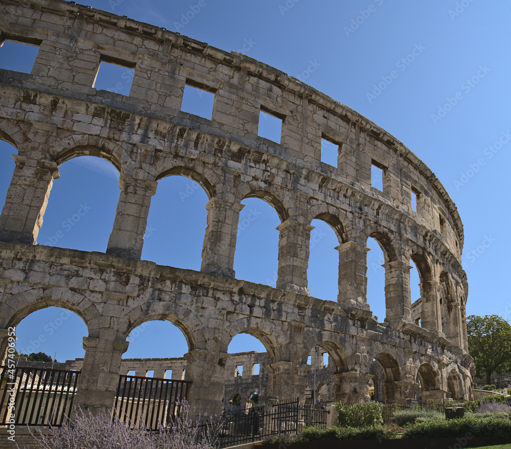 Obraz premium Pula, Croatia - August 20, 2021: Pula Arena - the only remaining Roman amphitheatre to have four side towers entirely preserved