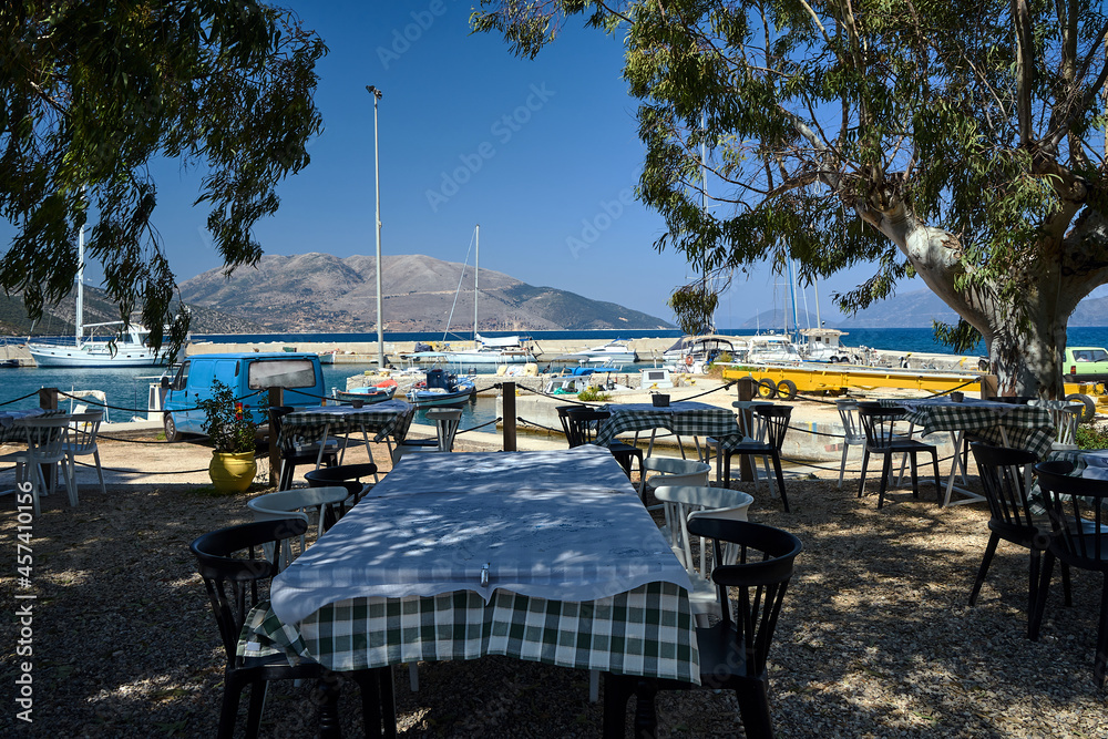 Tavern tables in the port of Sami on the island of Kefalonia in Greece
