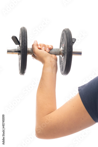 Girl doing weights with some dumbbells.