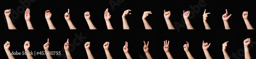 Alphabet International sign language black background photo