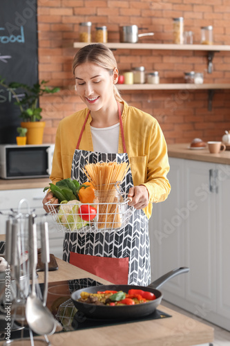 Young housewife with fresh ...