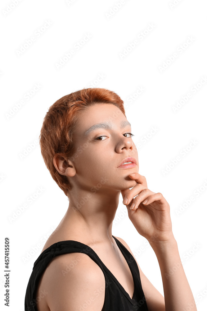 Teenage boy with dyed eyebrows on white background Teenage boy with dyed eyebrows on white background