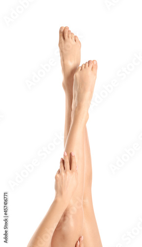 Legs of beautiful woman on white background