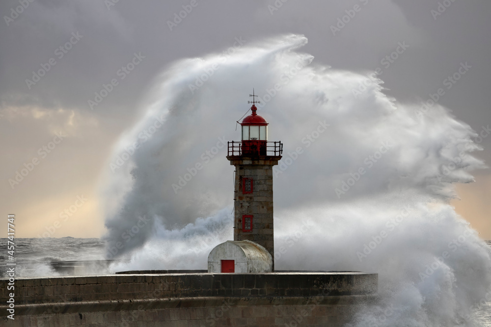Big wave splash at the lighthouse
