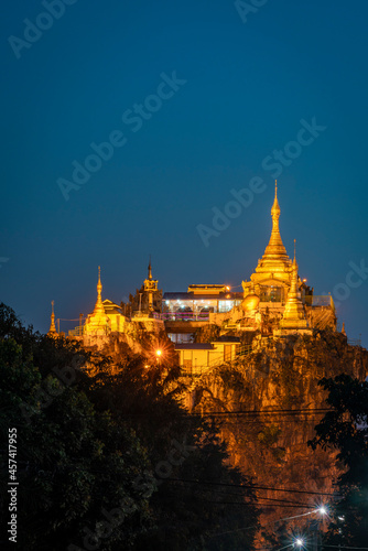 Taung Kwe Pagoda on Thirri Mingala Hill at night, Loikaw, Myanmar photo