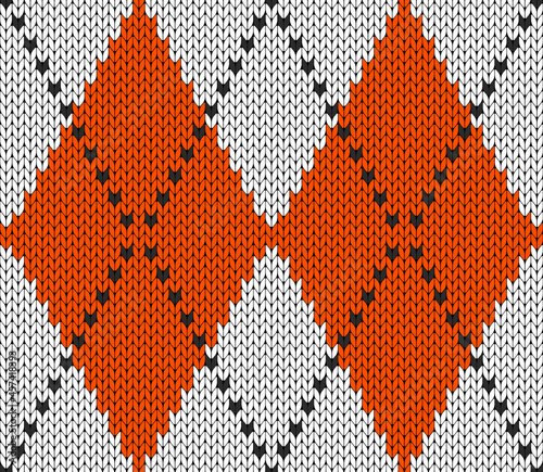Knitted argyle Halloween pattern. Wool knitinng. Scottish plaid in orange, black and white rhombuses. Traditional Scottish background of diamonds . Seamless fabric texture. Vector illustration