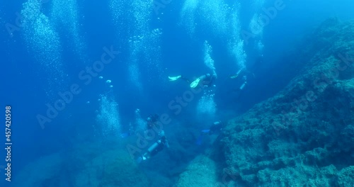 Wallpaper Mural scuba divers scenery underwater with air bubbles in blue ocean Torontodigital.ca
