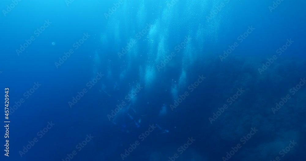 scuba divers scenery underwater with air bubbles in blue ocean scuba divers scenery underwater with air bubbles in blue ocean