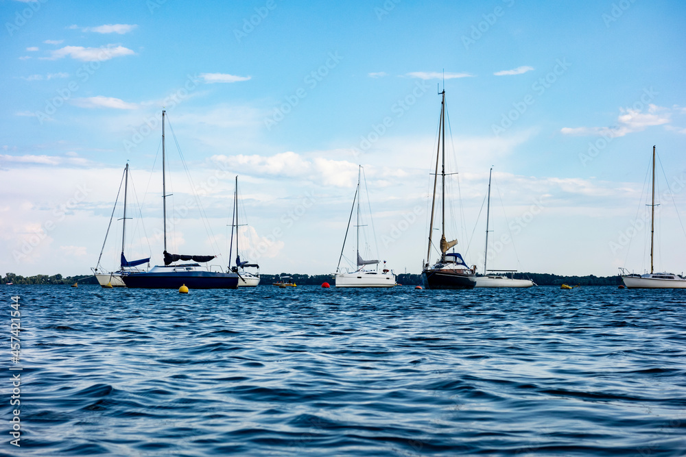 Sailboat moored in the harbor for boats, yachts and sailboats in a recreational destination Sailboat moored in the harbor for boats, yachts and sailboats in a recreational destination