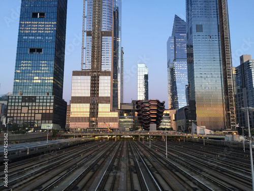 Hudson Yards reflections and the railway station during the sunset