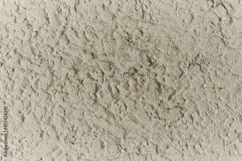 cement texture with elongated streaks and stain