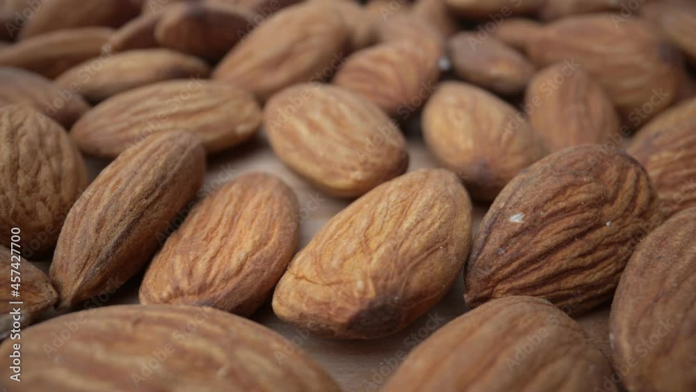Extreme macro, bottom movement of almond kernels, for vegetarians and nutritious food. Biologically pure. Extreme macro, bottom movement of almond kernels, for vegetarians and nutritious food. Biologically pure.