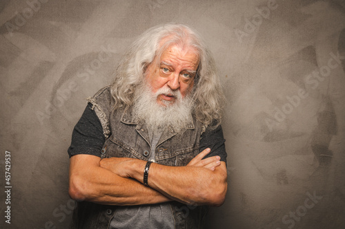 Grizzled Old Rogue with Long Gray Hair and White Beard Clowns for the Camera photo