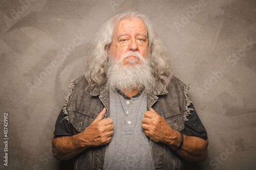 Grizzled Old Rogue with Long Gray Hair and White Beard Clowns for the Camera photo