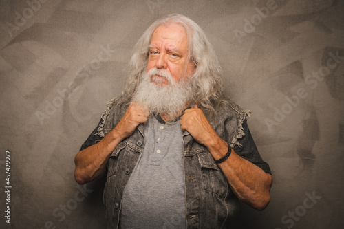 Grizzled Old Rogue with Long Gray Hair and White Beard Clowns for the Camera photo