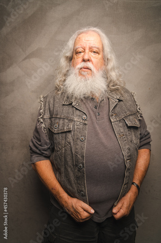 Grizzled Old Rogue with Long Gray Hair and White Beard Clowns for the Camera photo