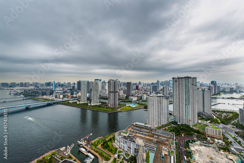 豊洲から見た東京の都市風景 Tokyo cityscape with cloudy sky.
