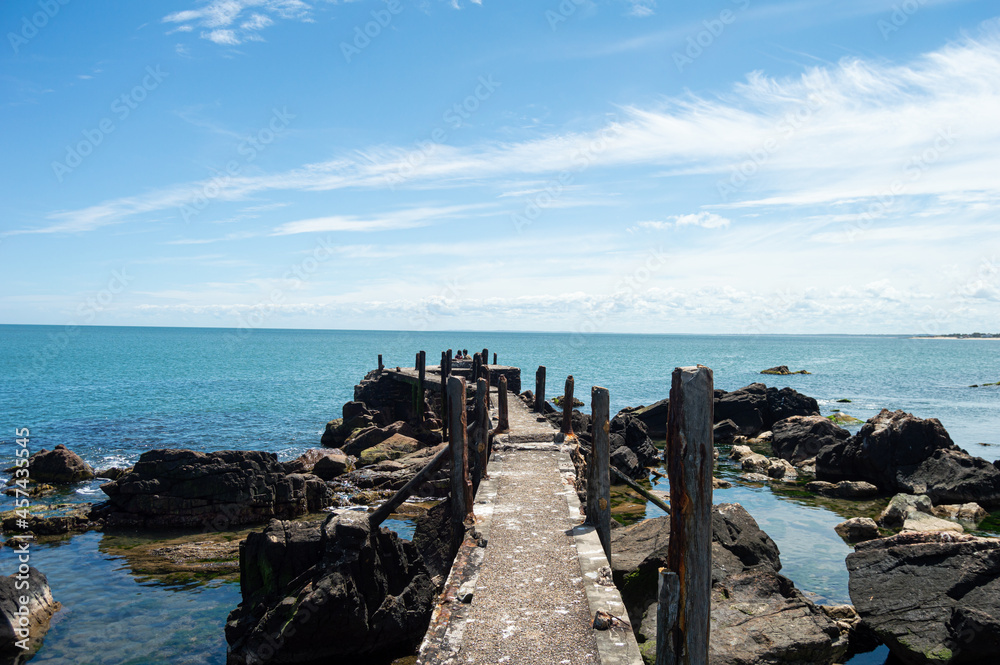 Path between rocks on the coast
