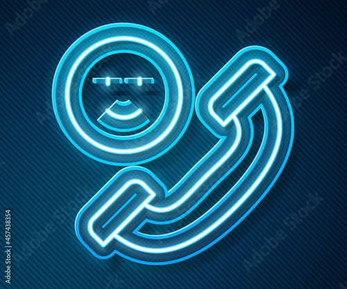 Glowing neon line Incoming call on mobile phone icon isolated on blue background. Friends call. Vector