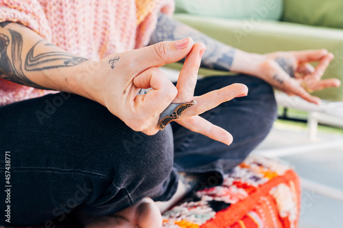 Closeup of woman's hands in yoga meditation mudra