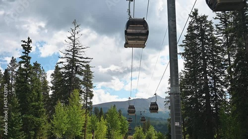 gondola or ski lift going up mountain in Breckenridge Colorado in summer photo