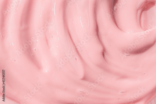 Moisturizing beauty creme, balm swatch, pink paint, yogurt texture. Peach cream, moisturizer, shampoo spread, sunscreen cosmetic smear background. Creamy pink skincare lotion mousse product closeup.