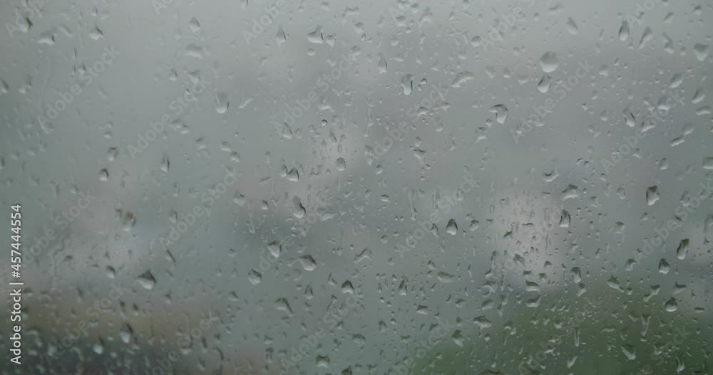Raining on the window at bad weather