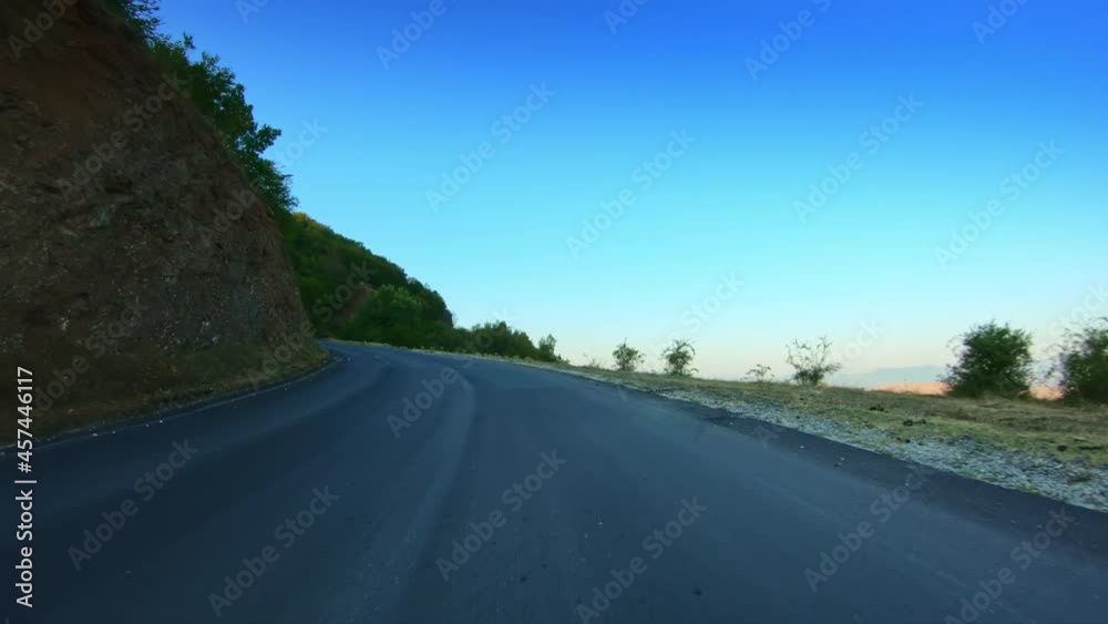 Nature, hilly scenery, beautiful sunny summer day, clear blue sky, car driver POV Nature, hilly scenery, beautiful sunny summer day, clear blue sky, car driver POV