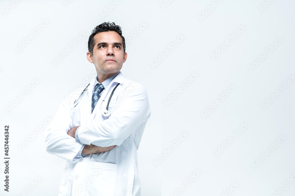 Portrait of cheerful smiling man doctor with arms crossed on white background. Portrait of cheerful smiling man doctor with arms crossed on white background.