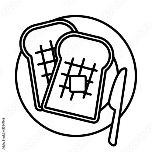 Bread and butter with knife on a plate.