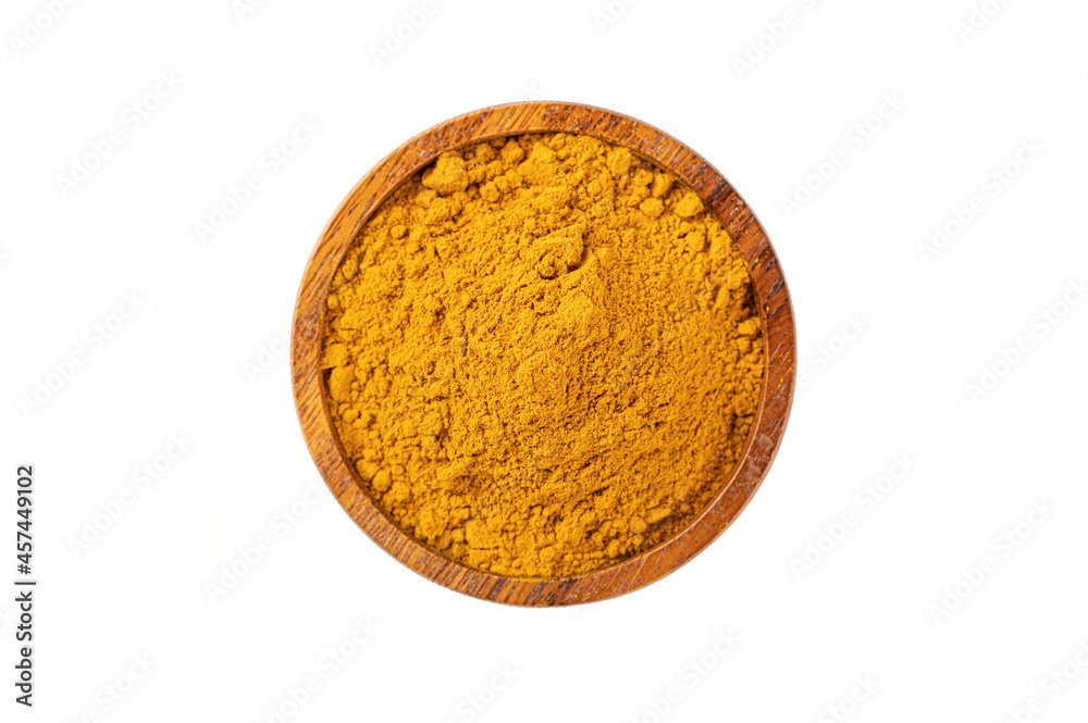 Close up Turmeric powder in wooden bowl on white background. Top view Close up Turmeric powder in wooden bowl on white background. Top view