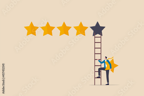 5 stars rating review high quality and good business reputation, customer feedback or credit score, evaluation rank concept, businessman holding 5th star climb up ladder to put on best rating. photo