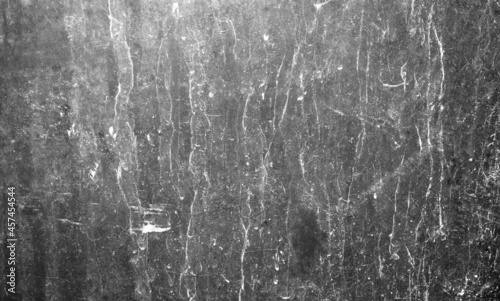 Abstract wallpaper in black and white tones of stained concrete texture for the background.