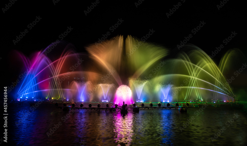The colorful fountain dancing in celebration festival with dark night sky background.	