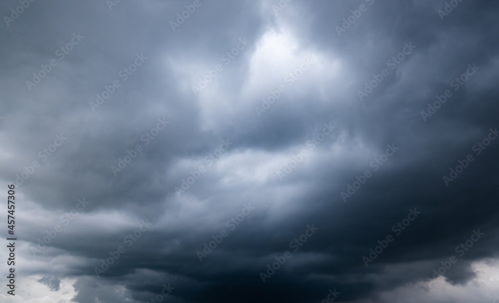 dark storm clouds with background,Dark clouds before a thunder-storm. dark storm clouds with background,Dark clouds before a thunder-storm.