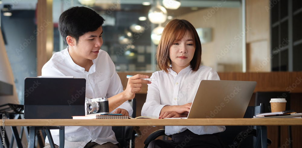 Businesspeople working on their project together in office room... Businesspeople working on their project together in office room...